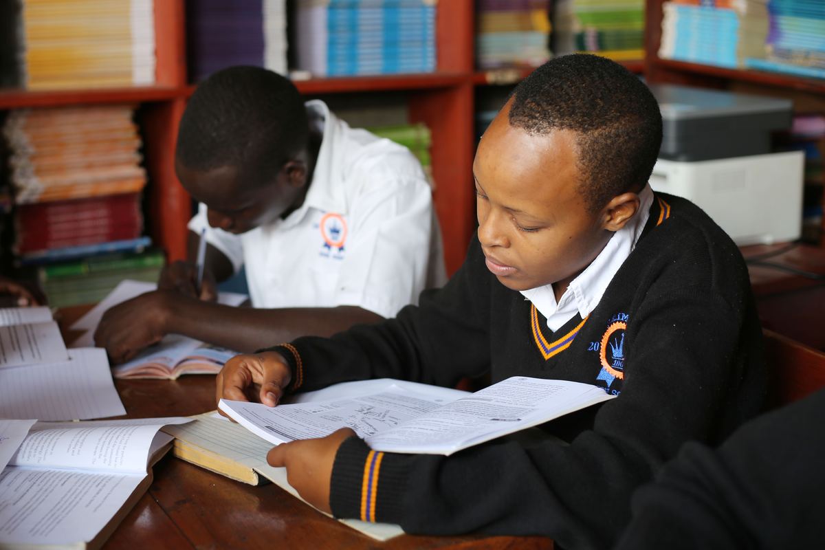 Students reading in the school library